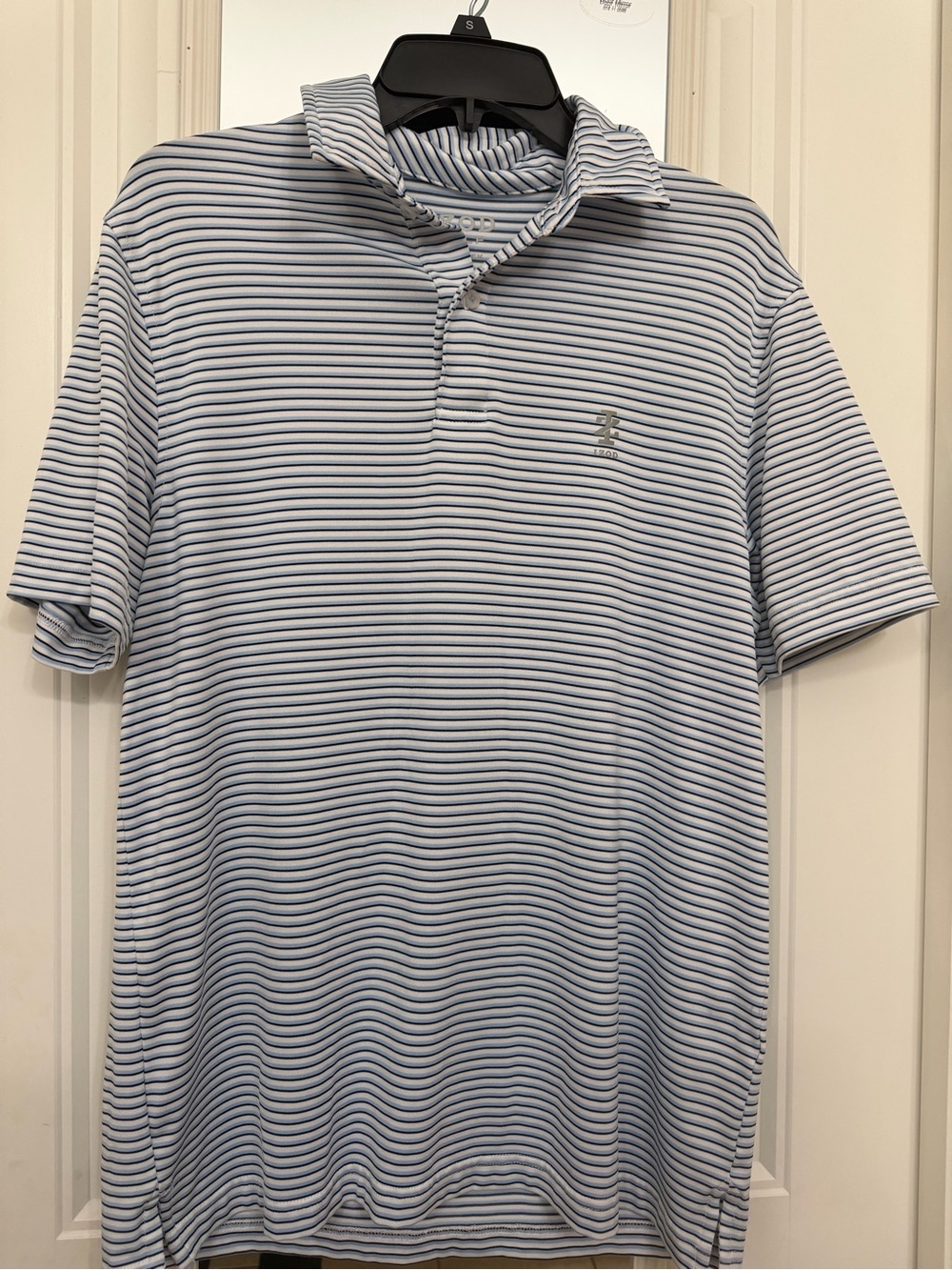 Striped Light Blue & White Polo Shirt with Subtle Logo